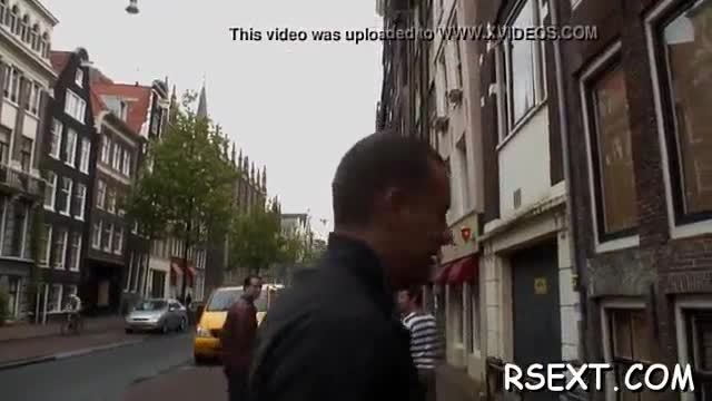 Black girl sucks a large pole